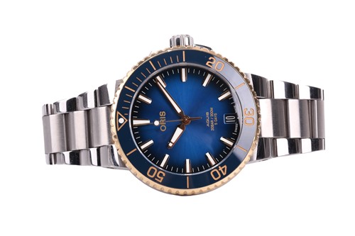 Lot 292 - An Oris Aquis Date bi-metal divers watch with...