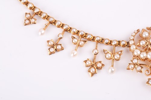 Lot 1 - A late Victorian seed pearl necklace featuring...