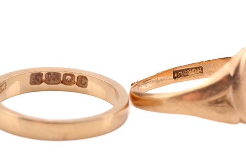 Lot 61 - Two 18ct yellow gold rings; to include a plain...