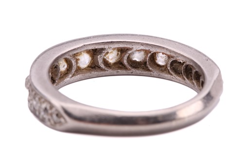 Lot 36 - A diamond half-eternity ring, pavé-set with...