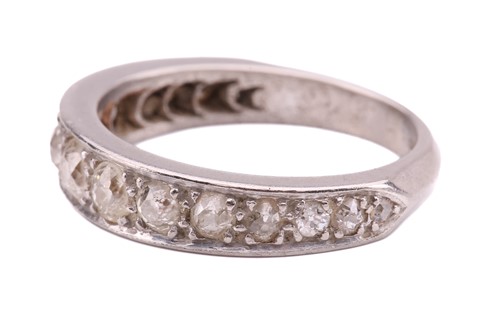 Lot 36 - A diamond half-eternity ring, pavé-set with...