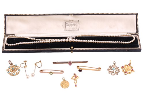 Lot 102 - A cultured pearl necklace, the largest pearl...
