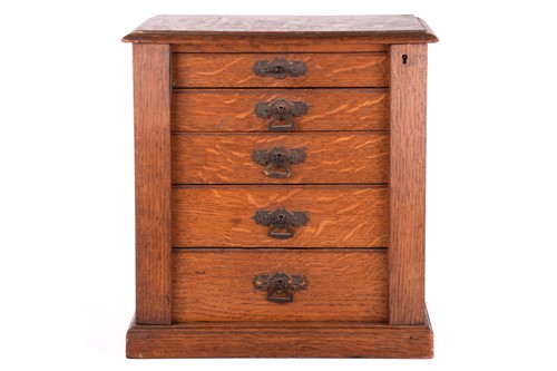 Lot 248 - A late Victorian oak collector's cabinet, the...