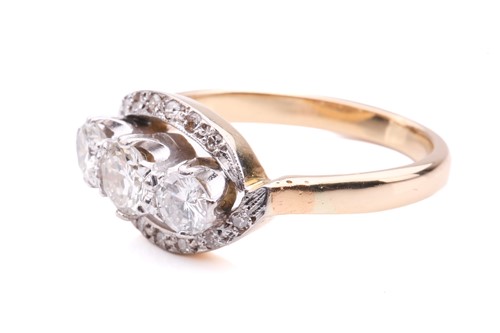 Lot 9 - A three-stone diamond crossover ring,...