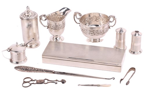 Lot 324 - A small collection of silver items including,...