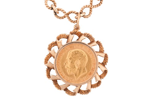Lot 157 - A George V half sovereign pendant on chain,...