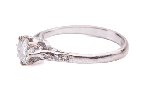 Lot 65 - A diamond solitaire ring, set with a round...