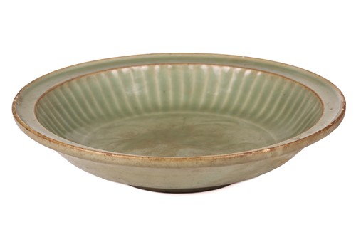 Lot 72 - A Chinese circular celadon dish, Southern...