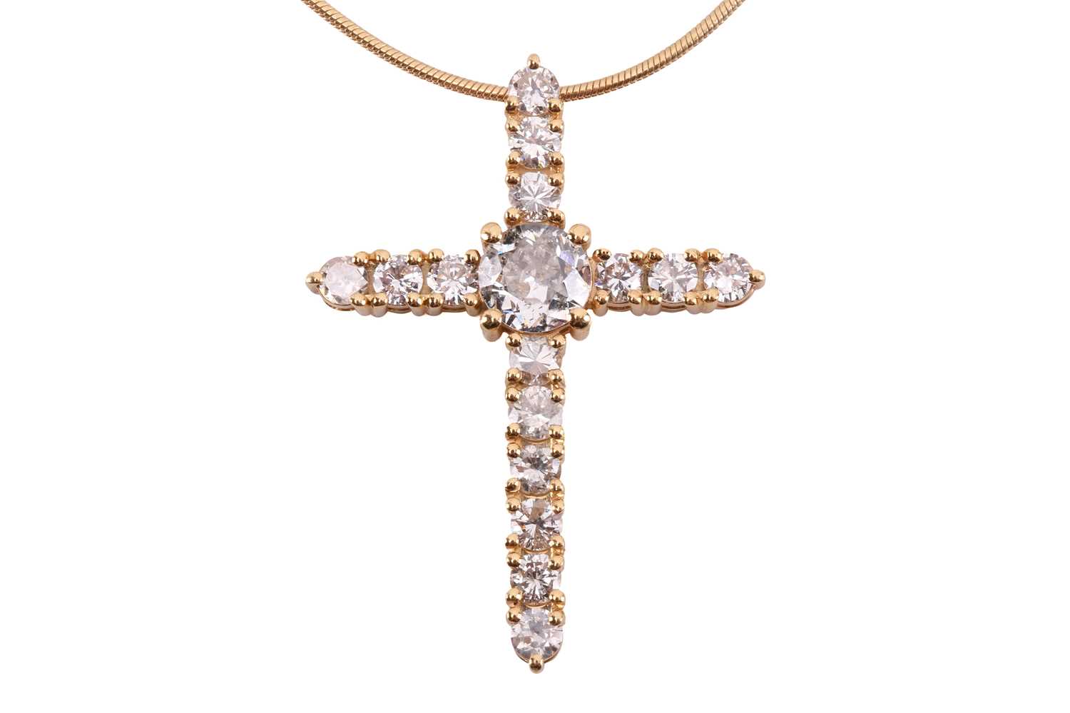 Lot 18 - A diamond cross pendant, set with an old cut...