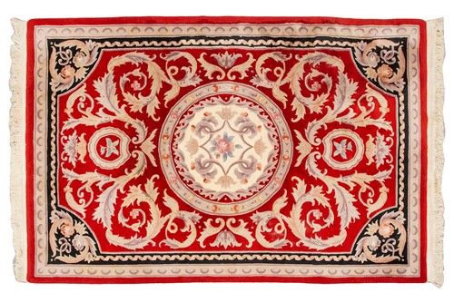 Lot 182 - A Chinese red ground neo-classical style...