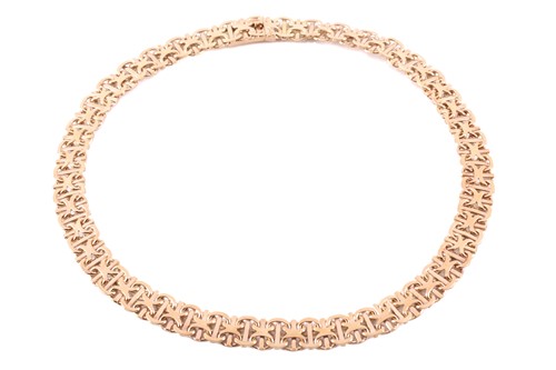 Lot 164 - A flat Bismarck link necklace, fastens with a...