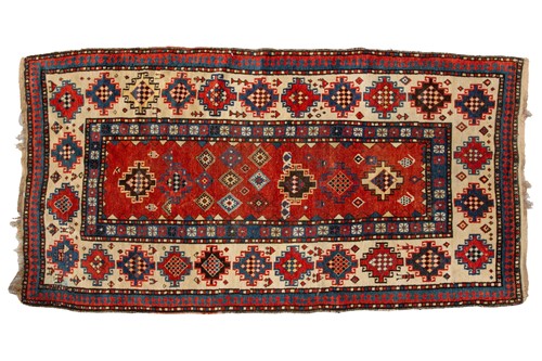 Lot 173 - An antique Caucasian Gendje rug with soft...