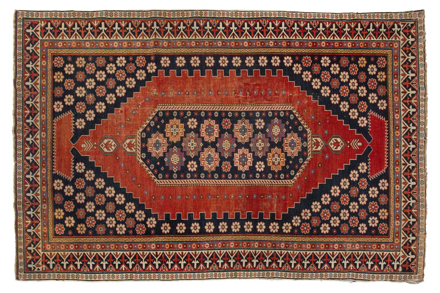 Lot 179 - An antique Armenian Erivan rug with red