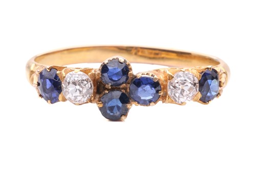 Lot 29 - A late Victorian half hoop sapphire and...