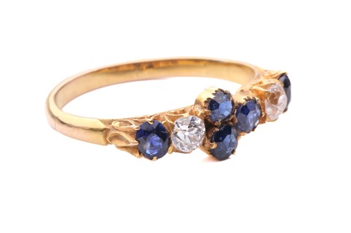 Lot 29 - A late Victorian half hoop sapphire and...