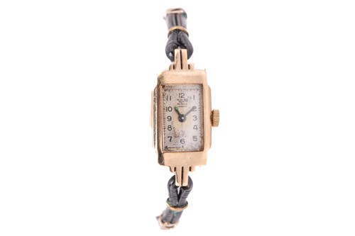 Lot 276 - A lady's 9 carat gold wristwatch; circular...