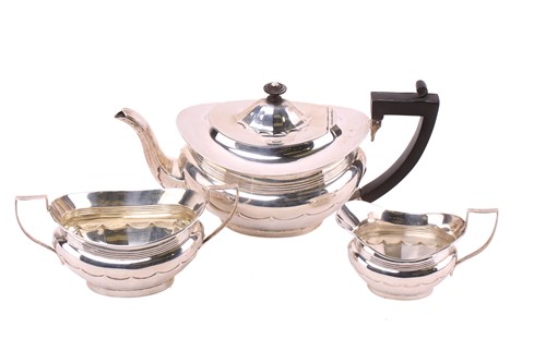 Lot 349 - An early 20th-century silver three-piece tea...