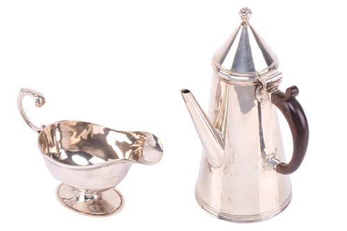 Lot 334 - A Victorian silver chocolate pot and sauce...