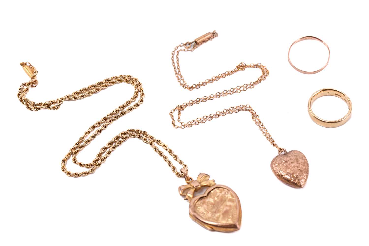 Lot 167 - Two gold wedding bands and two heart lockets...