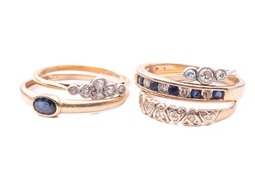 Lot 17 - Five gem-set rings, to include a diamond three-...
