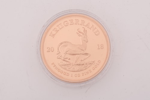 Lot 398 - A 2018 Krugerrand 1-oz Gold proof coin in a...