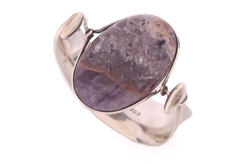 Lot 199 - Georg Jensen - 'Arm Ring' with amethyst, a...