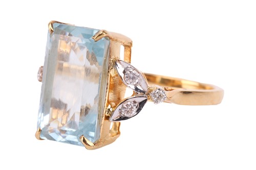Lot 50 - An aquamarine and diamond ring, featuring a...