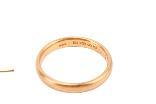 Lot 8 - A 22ct yellow gold wedding band, gem-set bar...