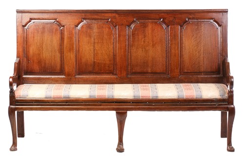 Lot 114 - A George III oak four-panel settle, probably...