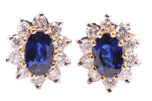 Lot 126 - A pair of diamond and sapphire earrings; the...