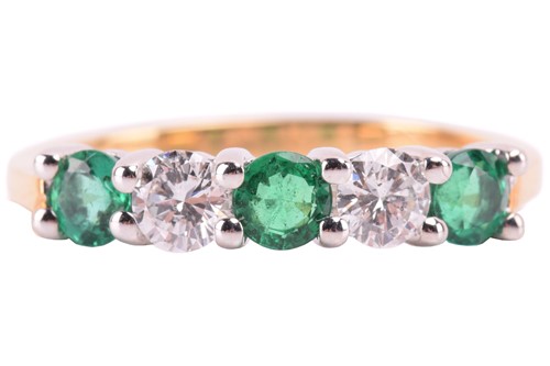 Lot 143 - An 18ct gold emerald and diamond five-stone...