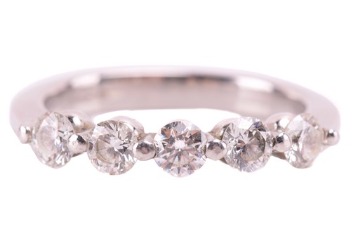 Lot 226 - A diamond five-stone ring in platinum, bar-set...