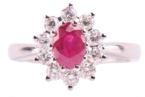 Lot 173 - An 18ct gold, ruby and diamond cluster ring;...