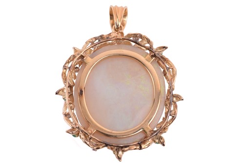 Lot 121 - A very large opal pendant, the precious opal...