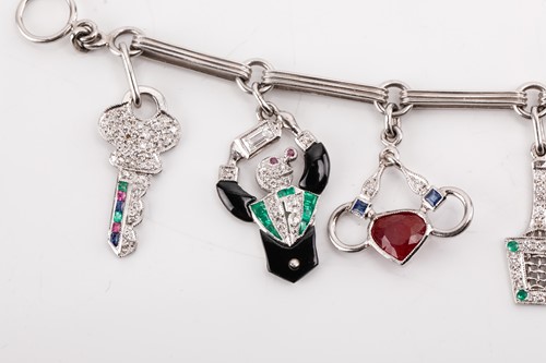 Lot 246 - An Art Deco-style gem-set charm bracelet,...