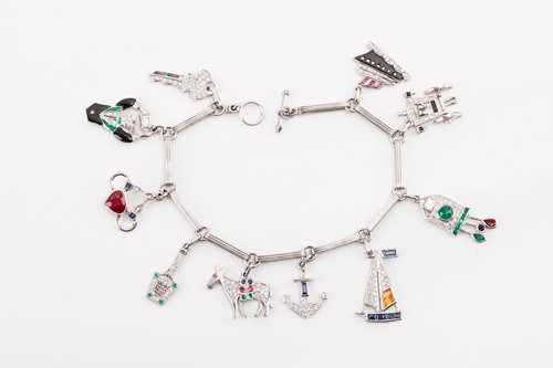 Lot 246 - An Art Deco-style gem-set charm bracelet,...