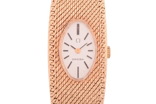 Lot 351 - An Omega Lady's dress watch in 9ct gold,...