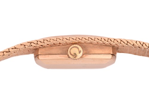 Lot 351 - An Omega Lady's dress watch in 9ct gold,...