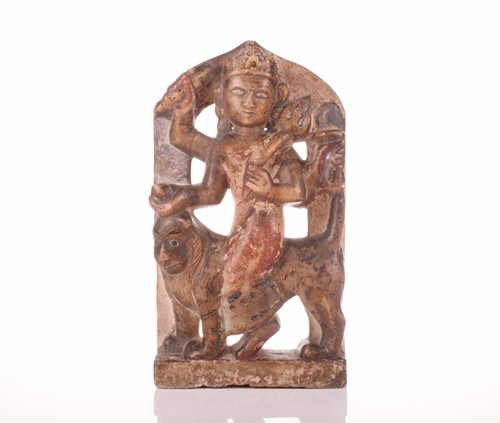 Lot 89 - An Indian carved and pierced marble figure...