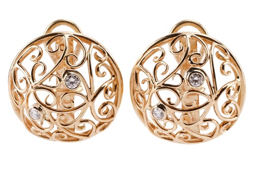 Lot 207 - A pair of diamond earrings of bombe form,...