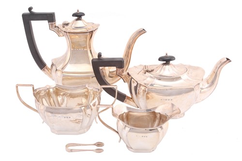 Lot 411 - A four-piece silver tea service, Birmingham...