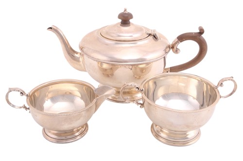 Lot 415 - A three-piece silver tea service, Birmingham...