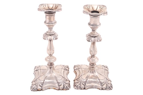 Lot 524 - A pair of George III style candlesticks,...