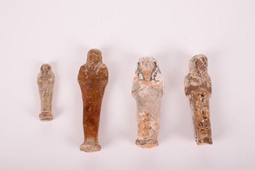 Lot 245 - An Egyptian faience shabti with signs of...