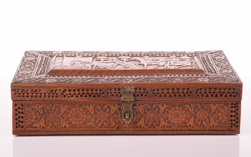 Lot 98 - A large finely carved Persian rectangular...