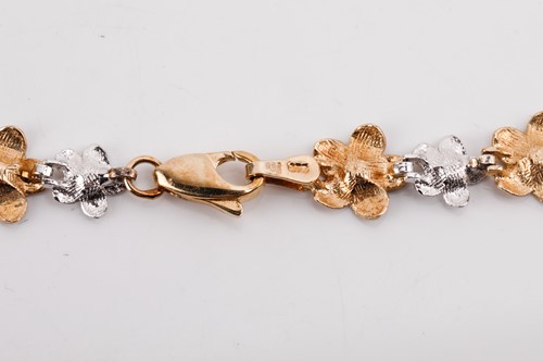 Lot 164 - A floral tri-colour necklace designed as a...
