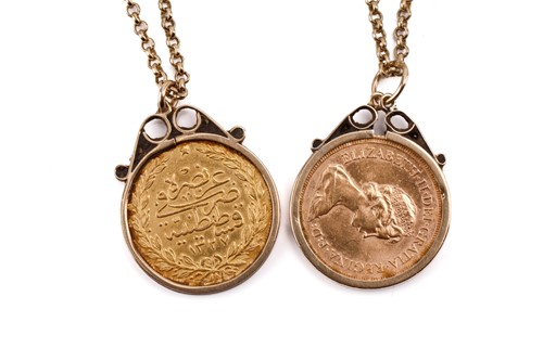 Lot 305 - Two mounted coins on 9ct gold chain;...