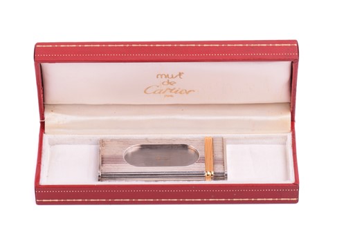 Lot 314 - Must de Cartier - a plated cigar cutter of...