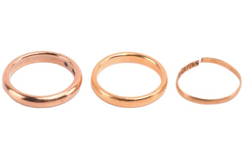Lot 187 - Three 22ct gold rings, including a rose gold...