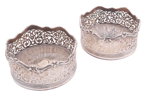 Lot 459 - Robert Garrard. A pair of Victorian silver...